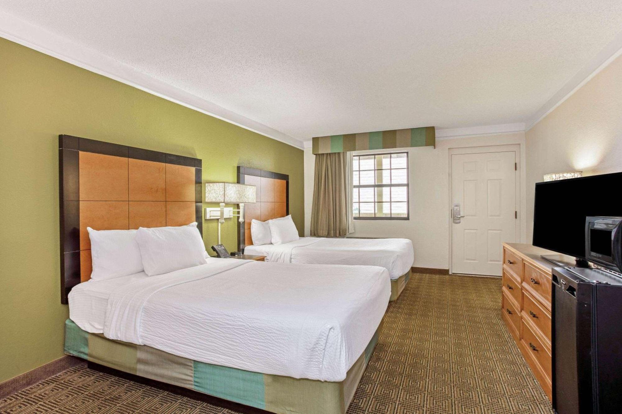 La Quinta Inn By Wyndham Orlando Airport West Exterior photo